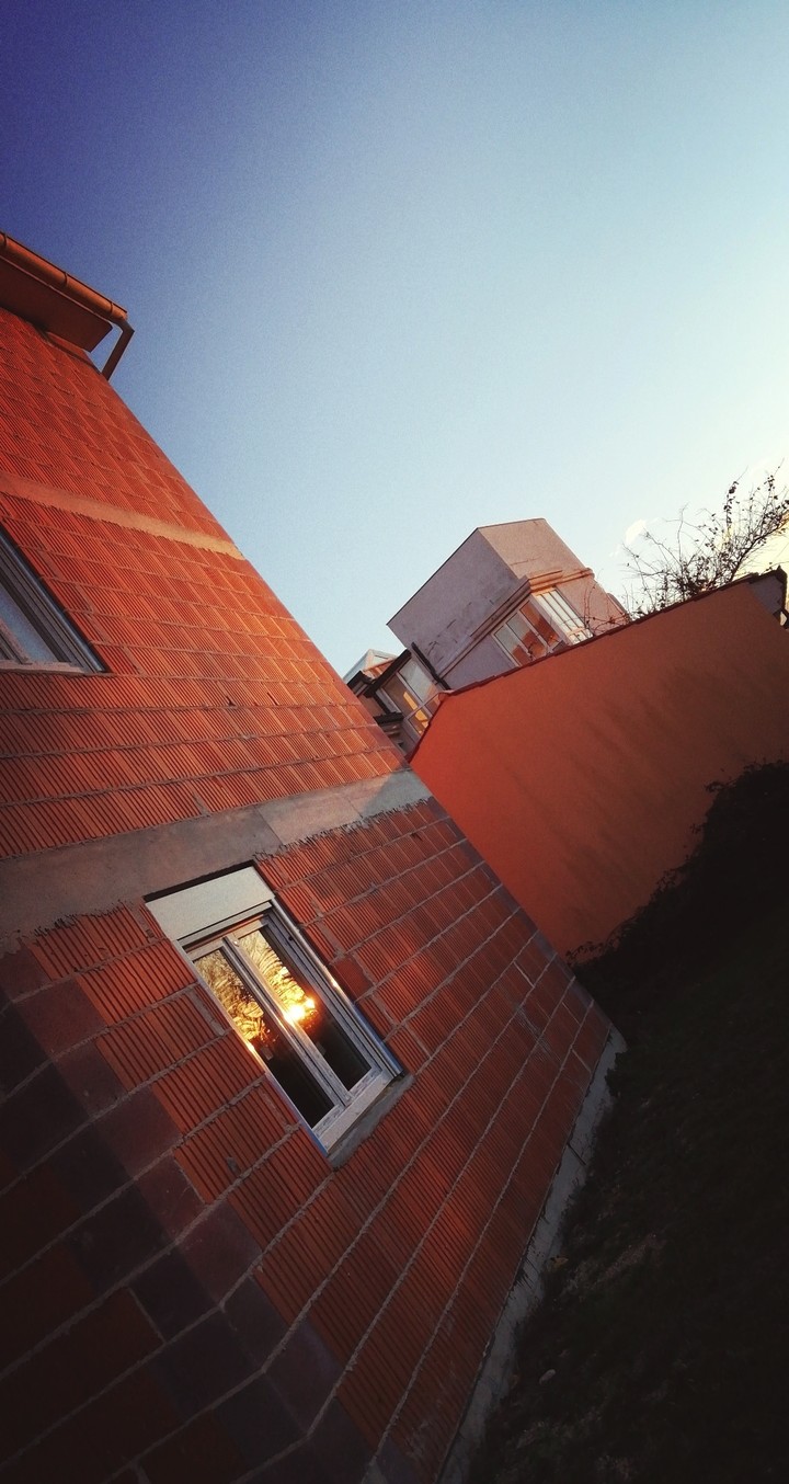 sunset on a house