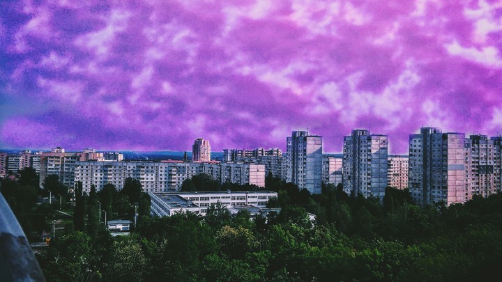 город
