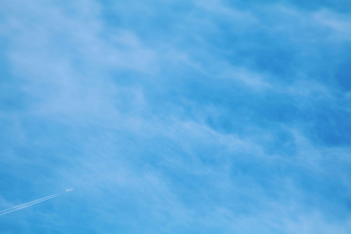 Clouds and a plane