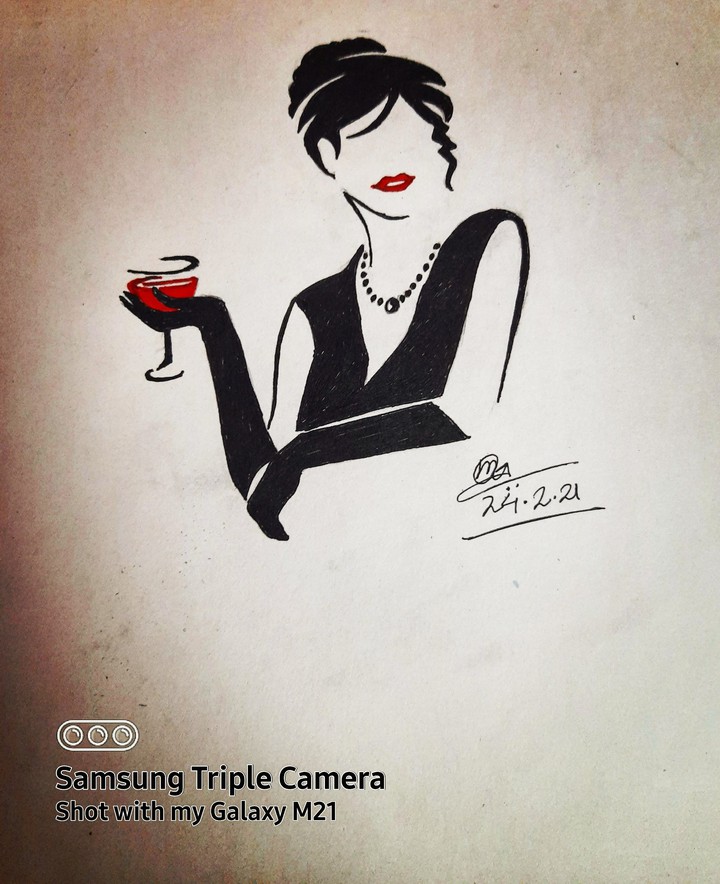 A lady with a glass of red wine..