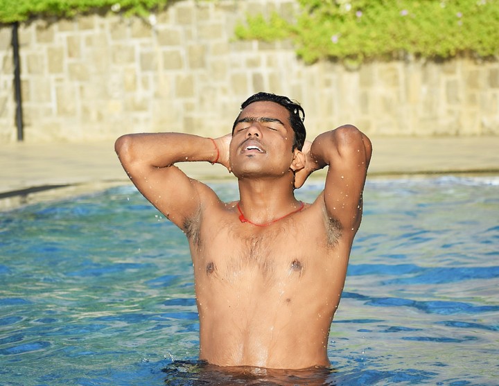 Hot boy in swimming pool