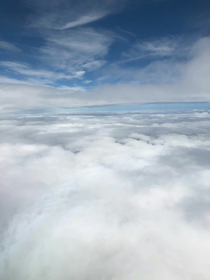 clouds near airplane