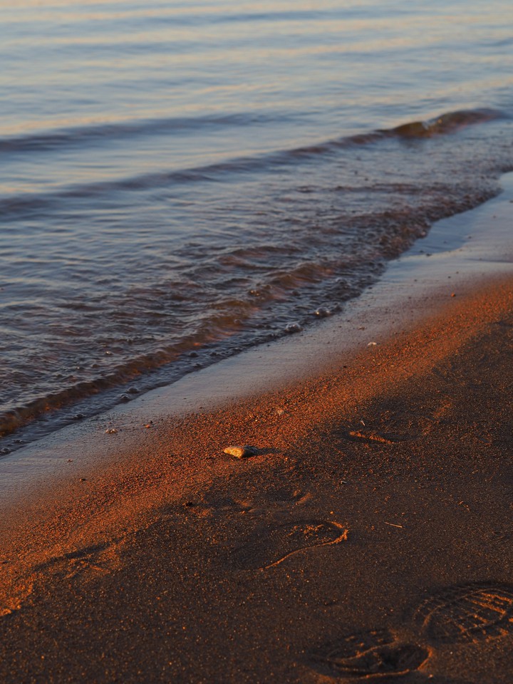 sunset on the river beach