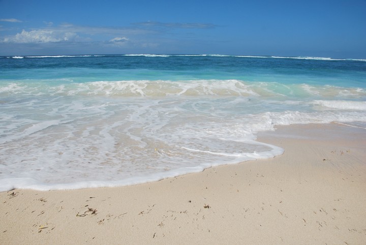 Blue ocean touched the white sand
