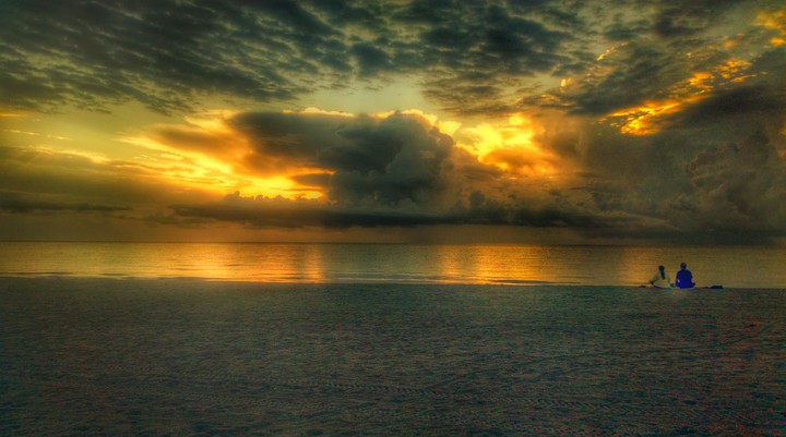 Couple Watches Sunrise