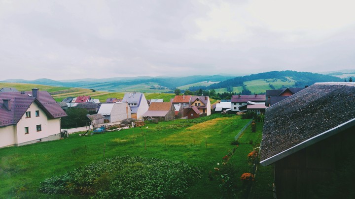 a village by the hills