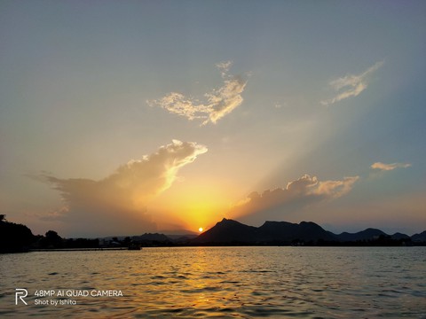 sunrise through the mountains