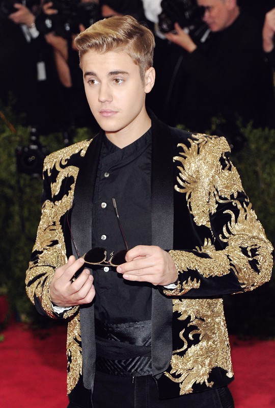 Justin in golden suit