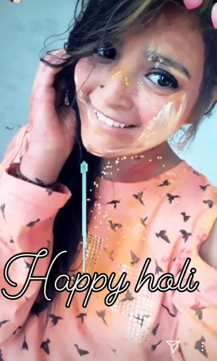 cutest girl playing holi