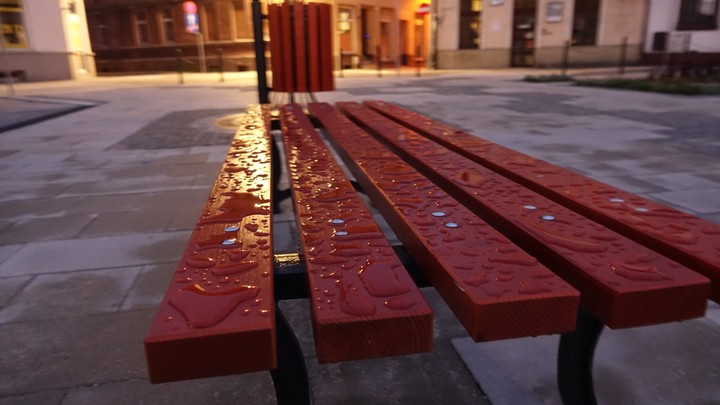 Bench in Pleszew after rain