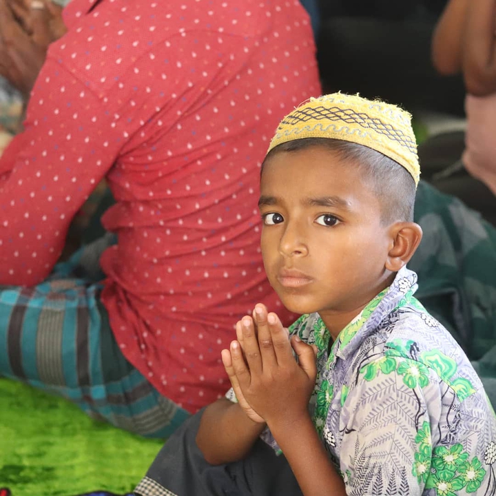 Children busy praying to the Lord