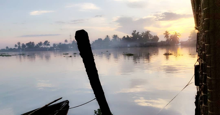 Sunrise from a morning from houseboat in allepey