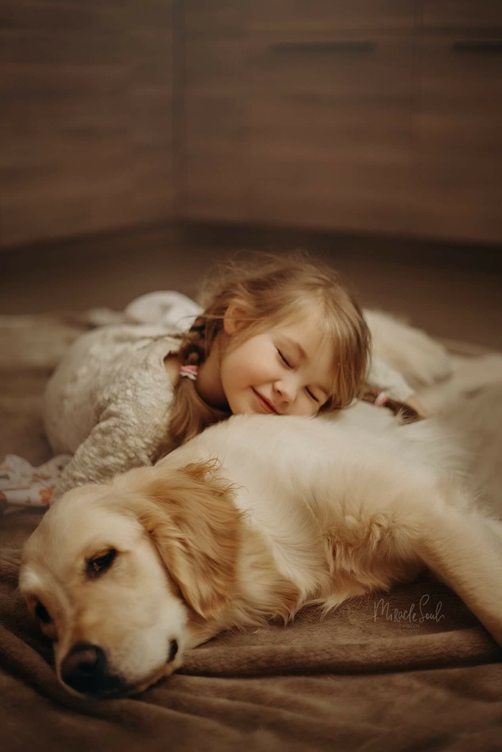 Sweet girl with her favourite pet.