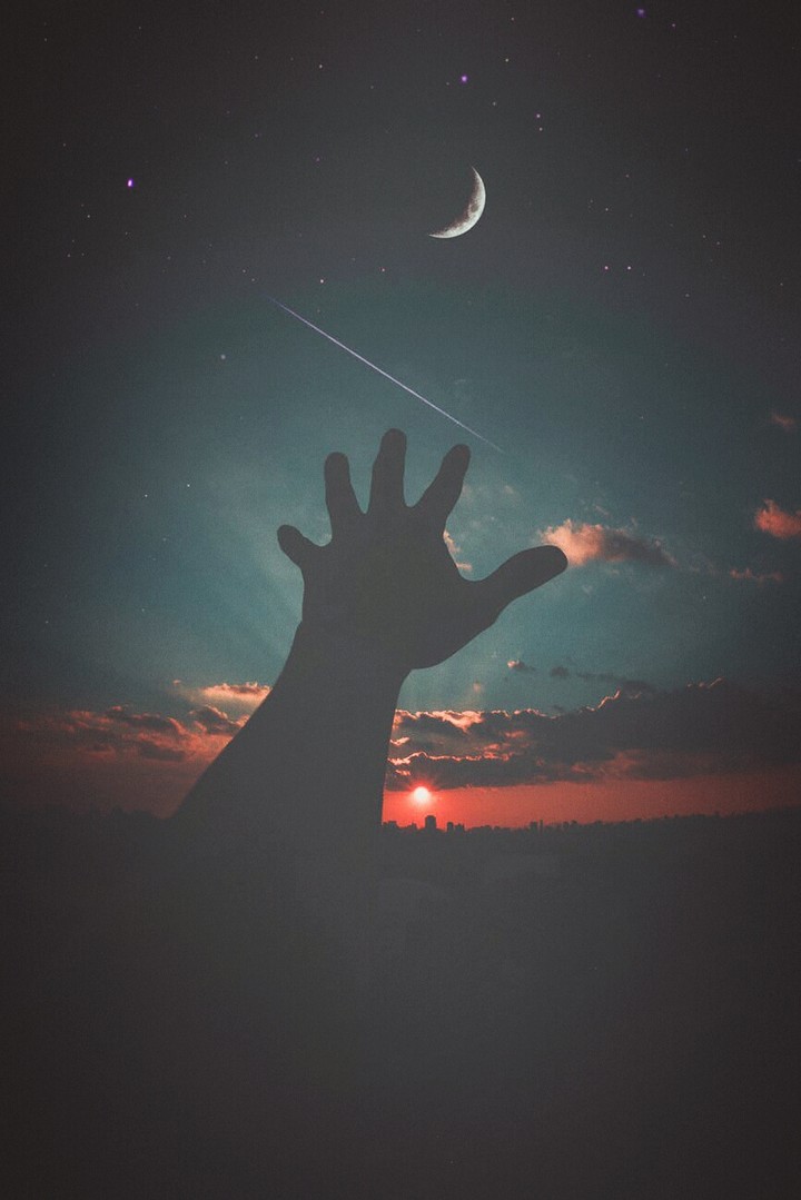 A Hand and a Beautiful Moon and a Sunset