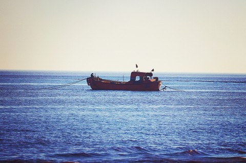 boot boat swimming alone