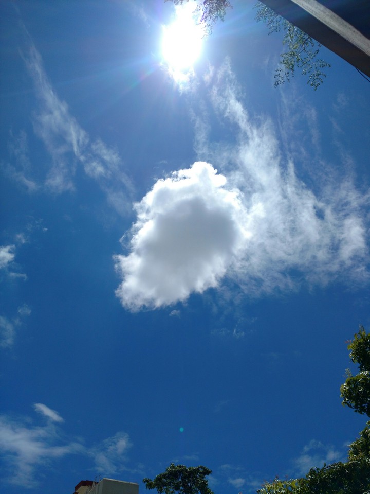 single cloud falling from sun