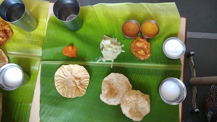 South Indian food served on banana leaf.