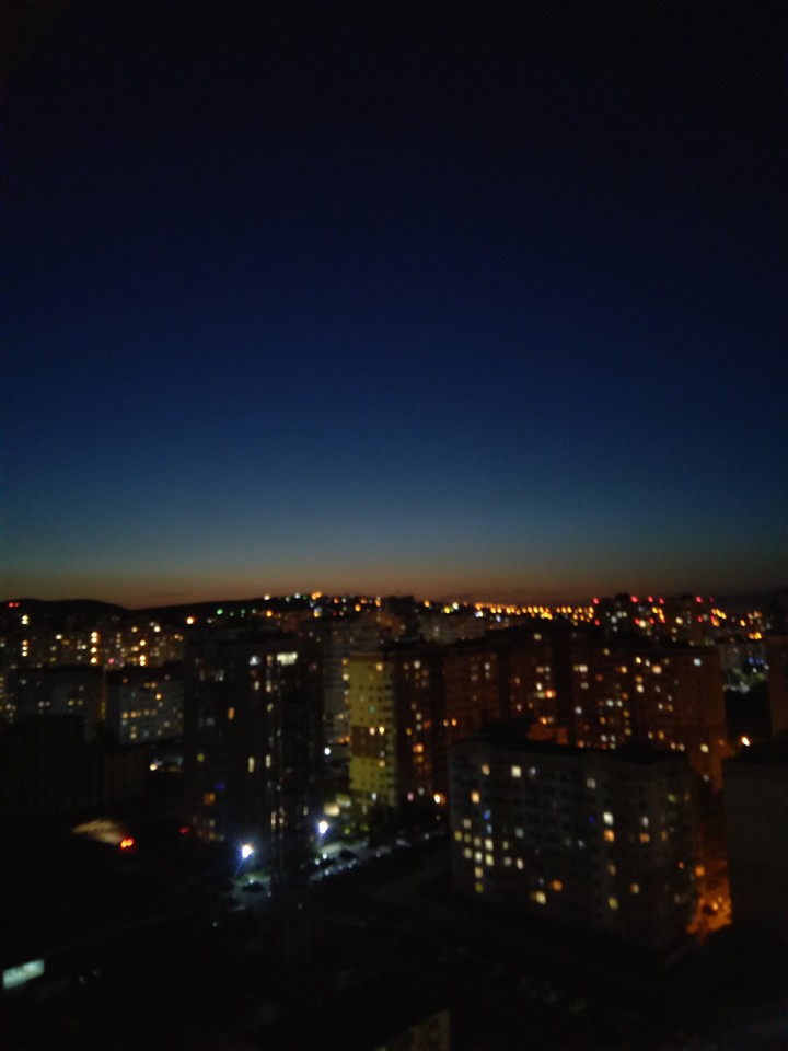город