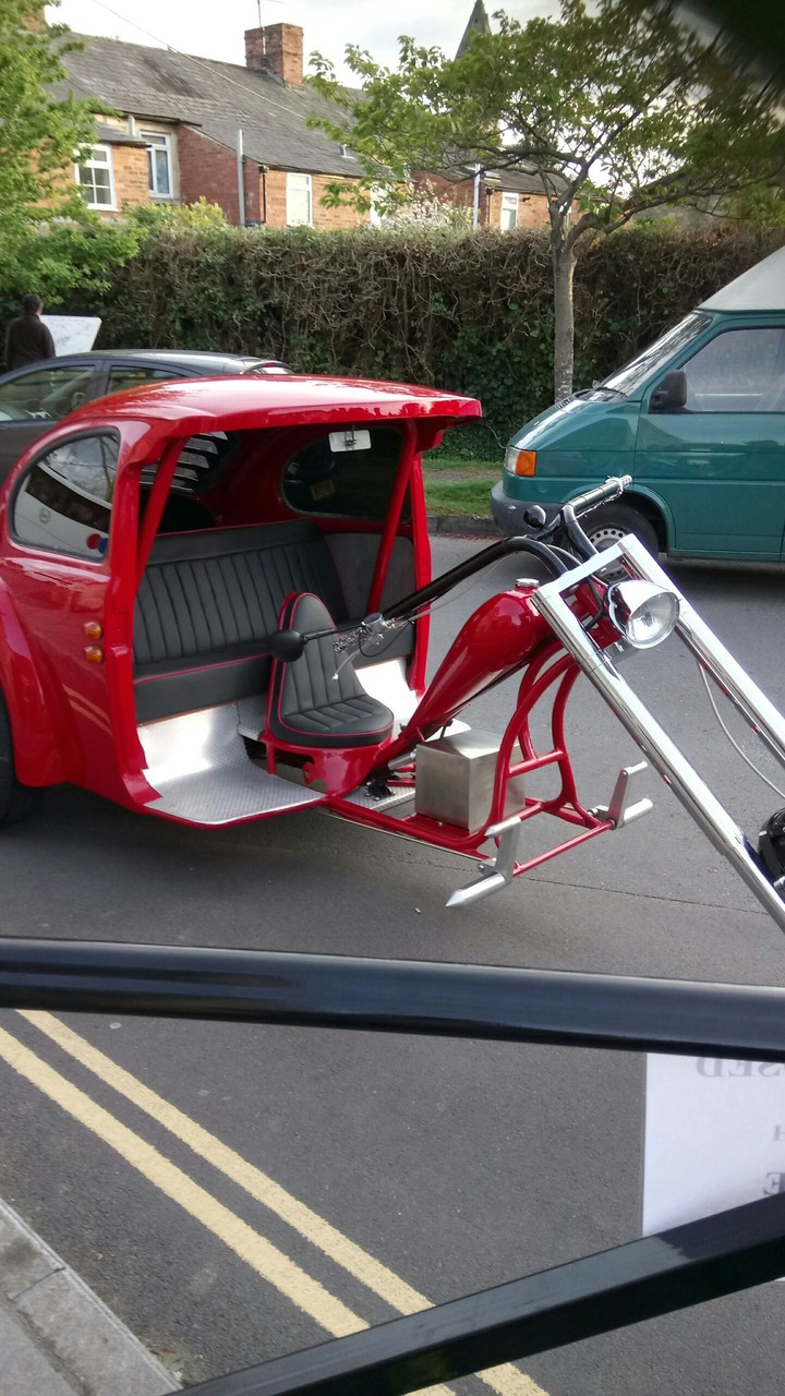 half beetle(car) and half bike(motorcycle)