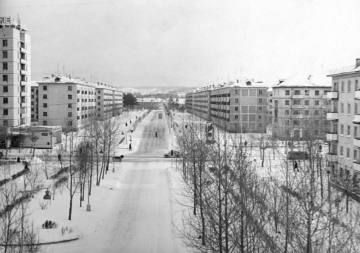 город