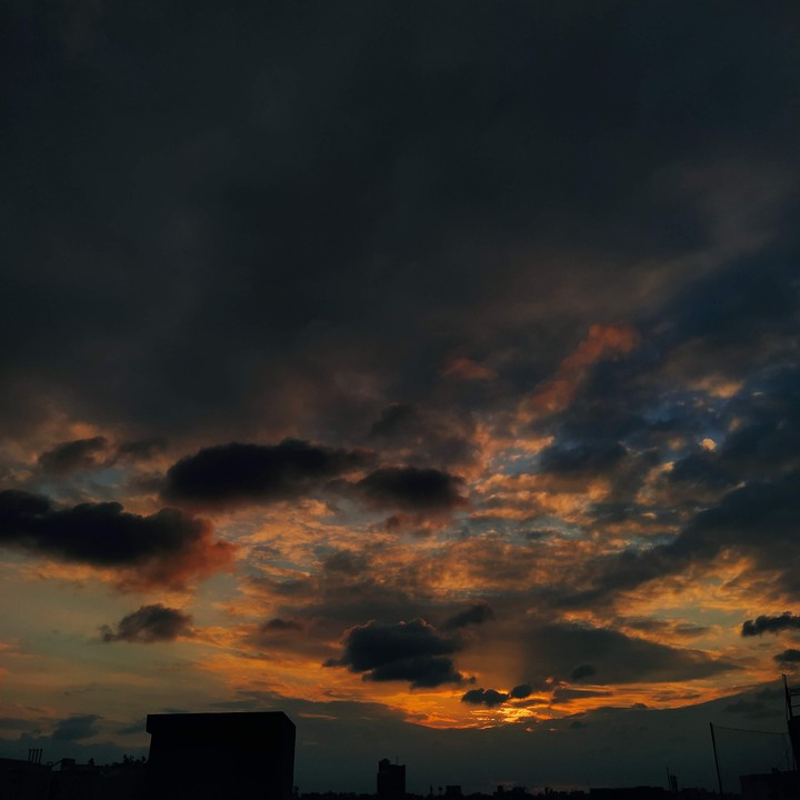 " Dark clouds became heaven's flower when kissed by light"