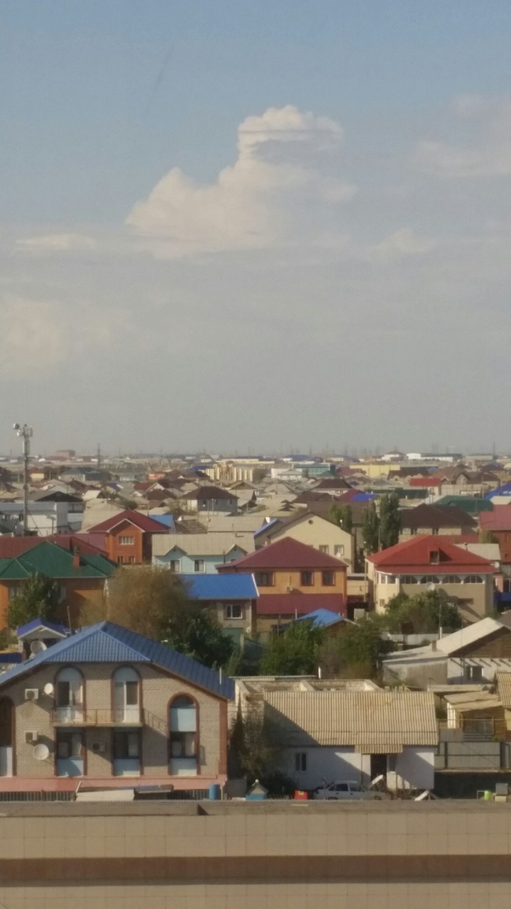 Город