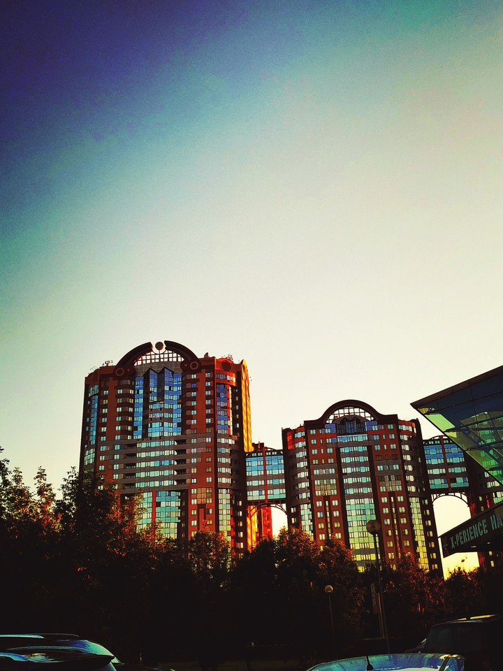 город