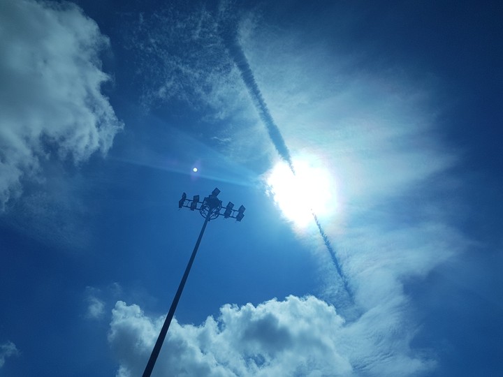 Airplane cut the clouds.