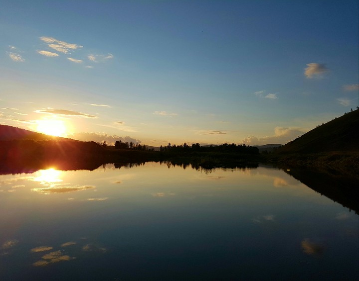 the sun. sunset. water.