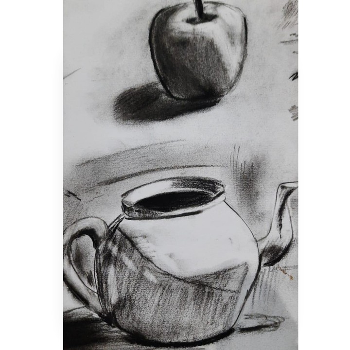An apple and a kettle