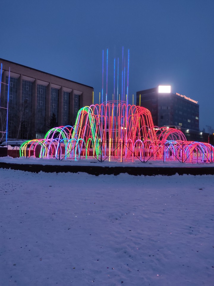 город