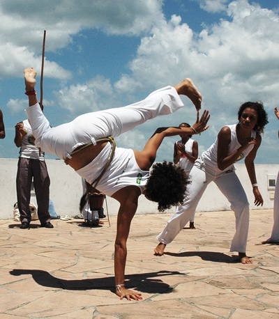 Capoeira mixes martial art, sport and music. Afro-brazilian