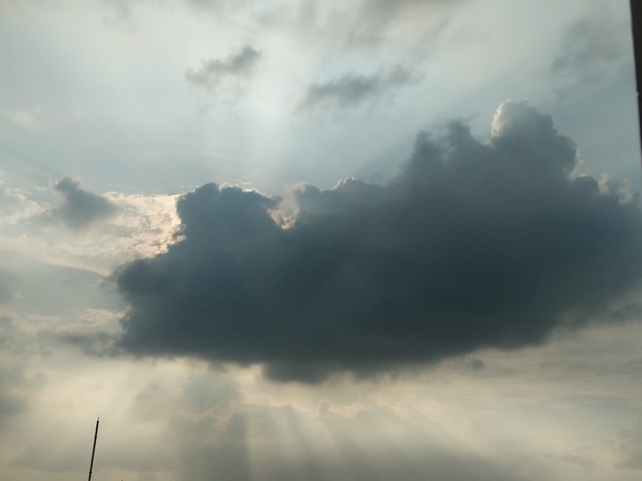 Golden rays of sun from sky