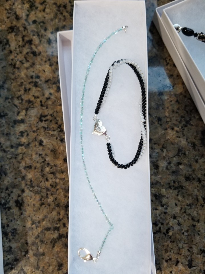 black & white  twisted along with turquoise single seed bead