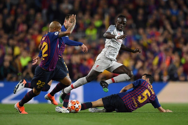 sergio busquets slide tackling mane
