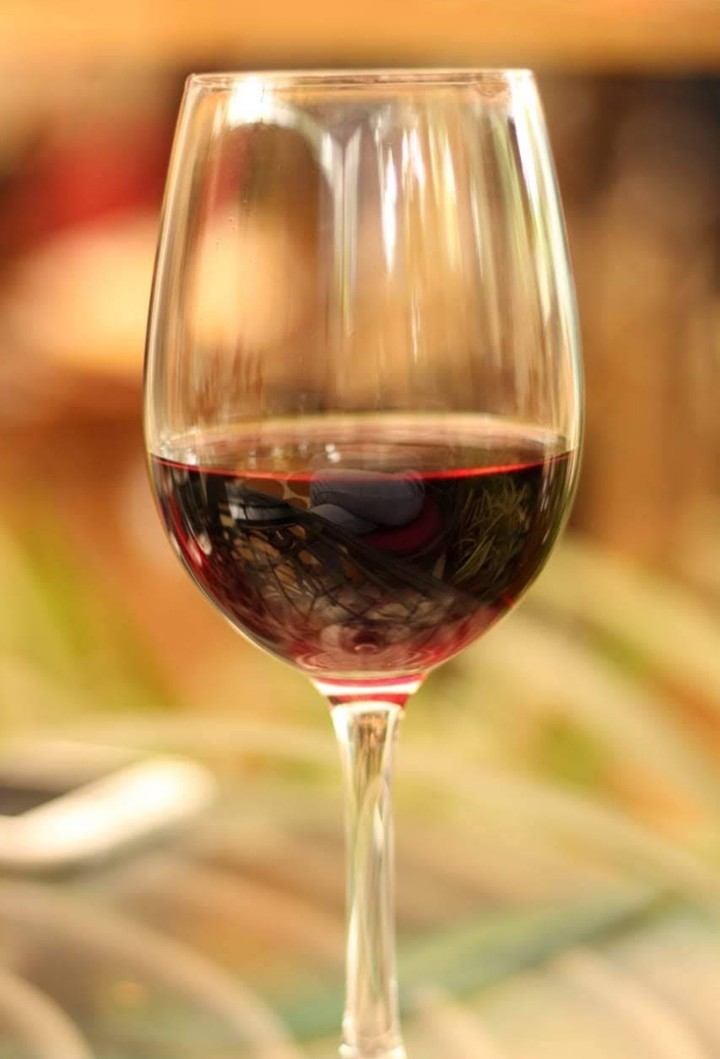 "it's a smile, it's a kiss, it's a sip of wine "