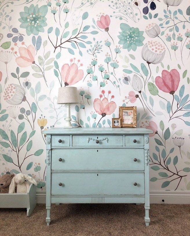 Flowers wall paint with nice cupboard