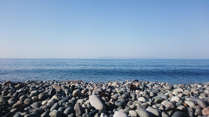Sea, Sun and waves.