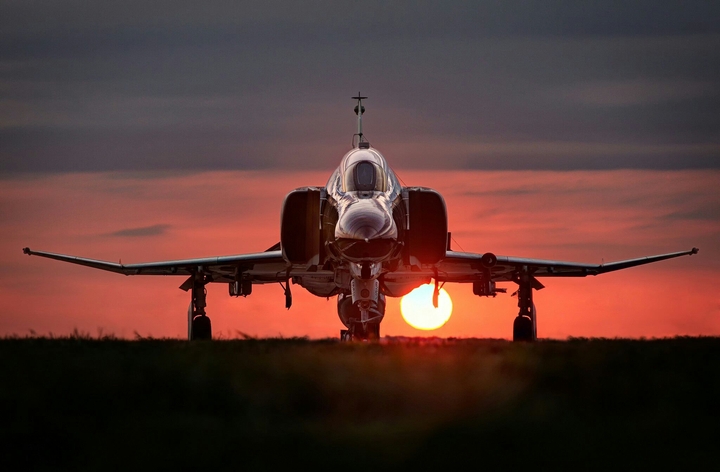 Airplane and sunset