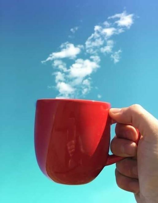 mug and clouds