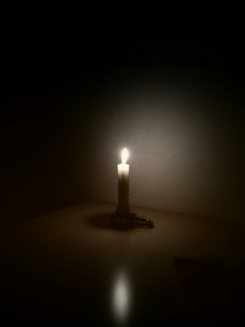 sad and lone candle