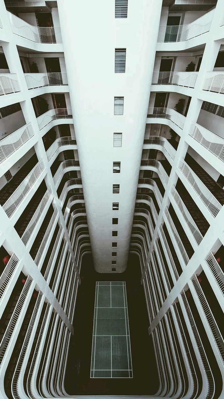 a tennis court in a building