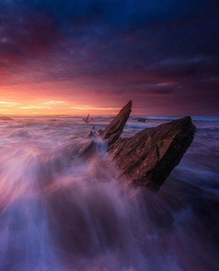 Rock... purple sunset...