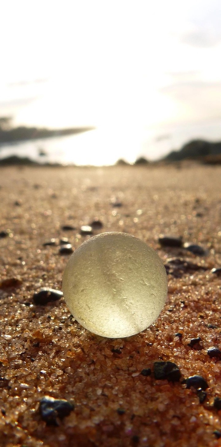 reflection of the sunlight on the sea glass