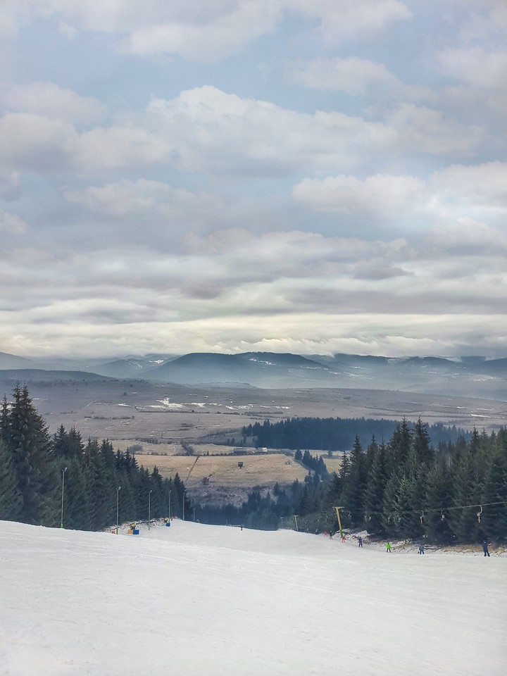 skiing in the mountains