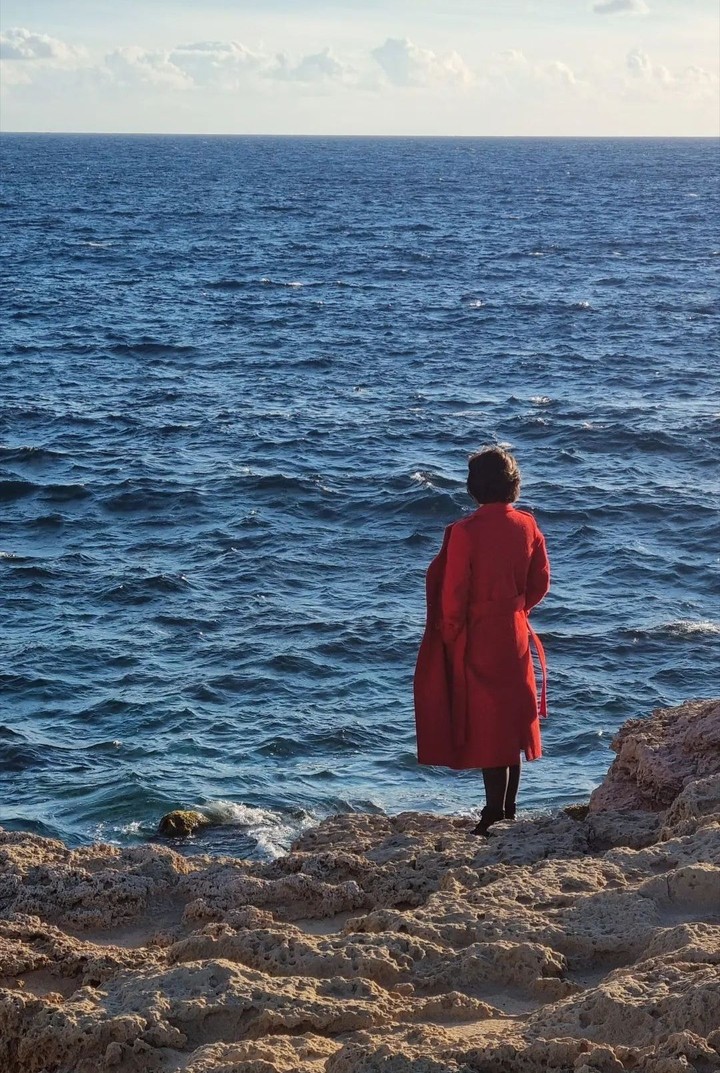in a red coat
