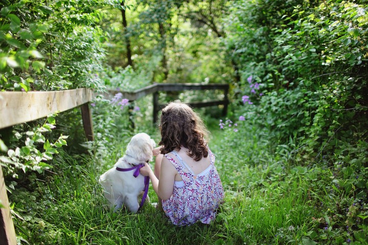 little girl with puppy