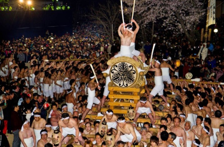 beating giant festival drum