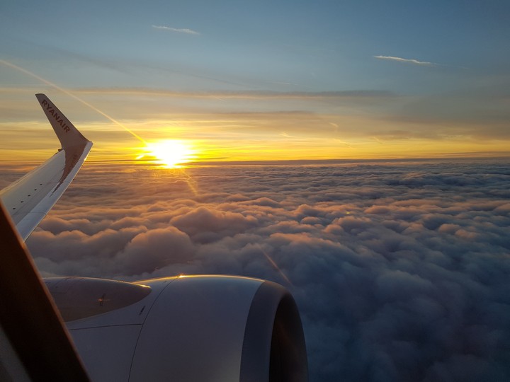 Sunset over the clouds:]