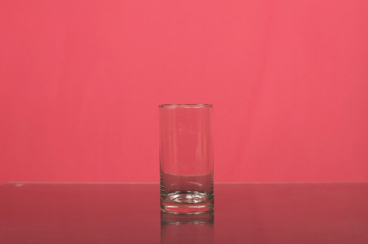 pink background with transparent glass